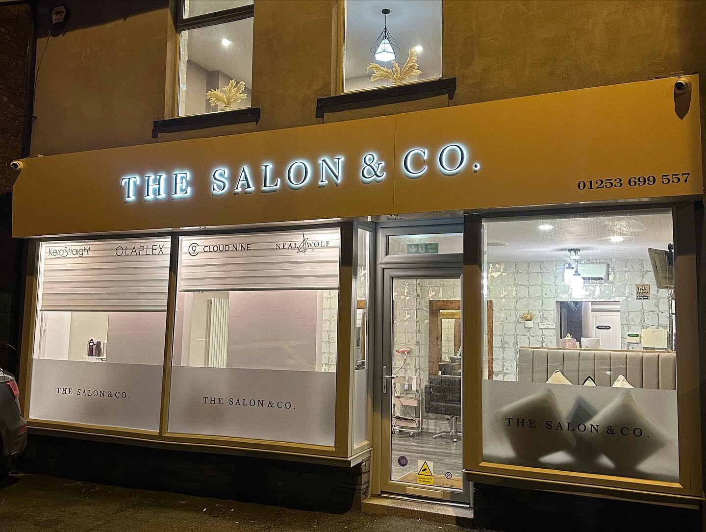 Outdoor illuminated shop sign installed by Ashton Signs, Blackpool