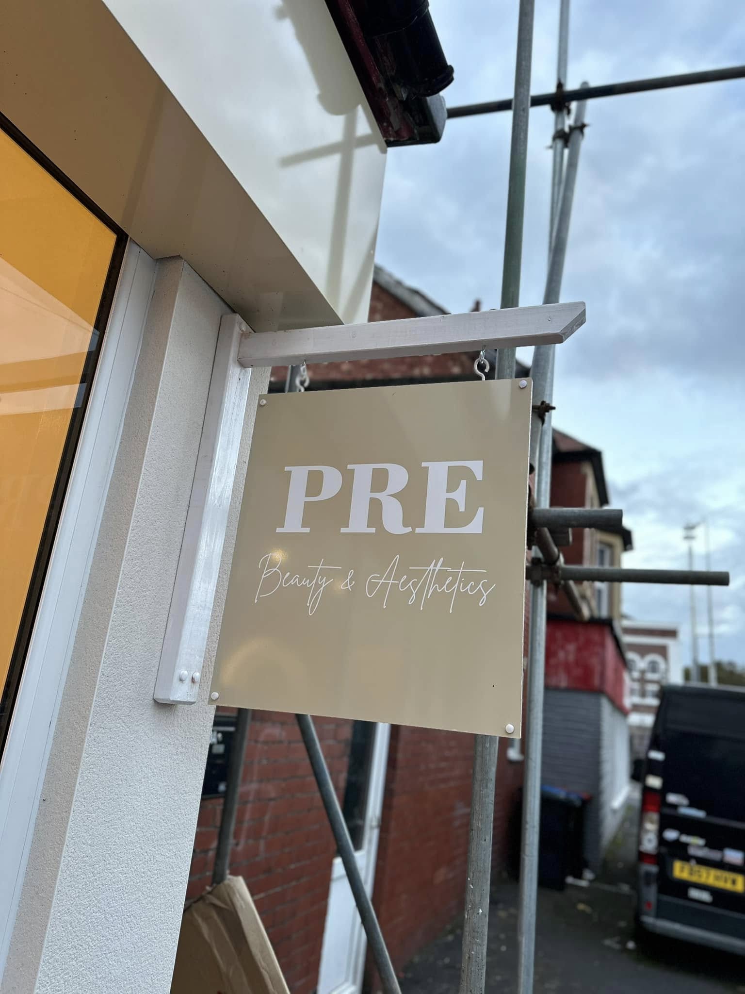 Outdoor hanging business sign designed and fitted by Ashton Signs, Blackpool